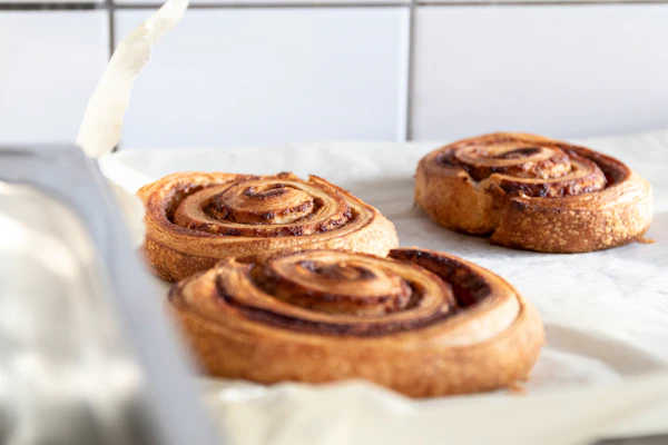 Fresh-baked cookies on white paper