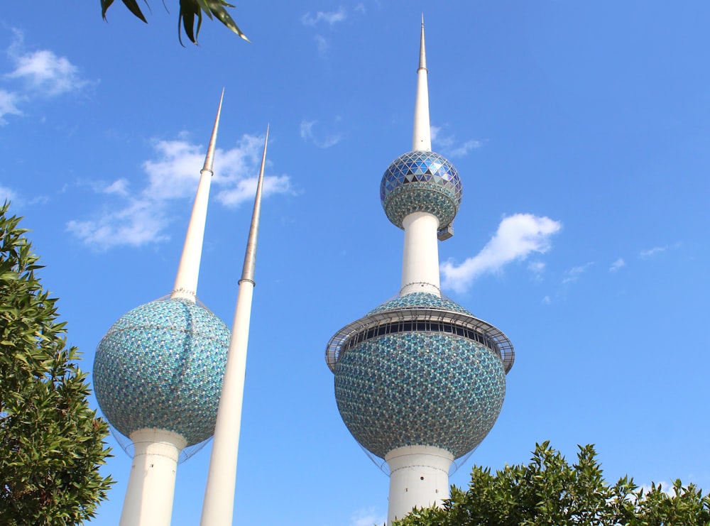 white and green concrete building under blue sky during daytime