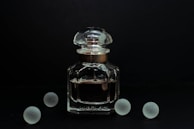 Elegant scene showing a perfume bottle with a smooth hover animation effect captured in motion.