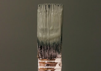 white and brown labeled soft tube