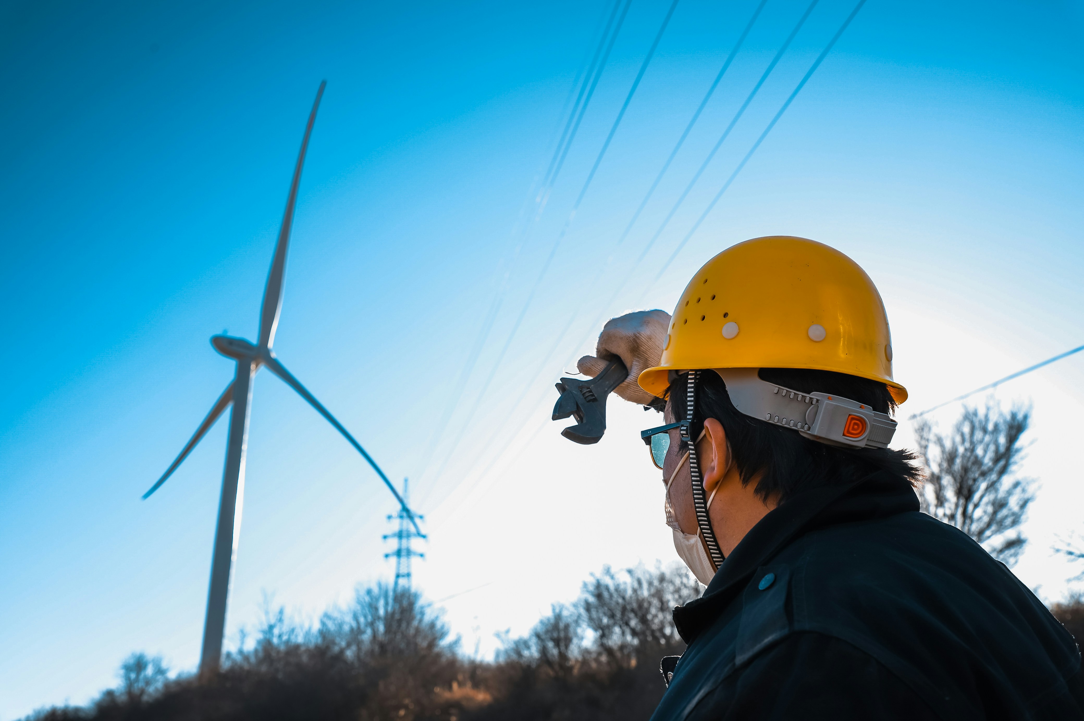 man in yellow helmet and black jacket