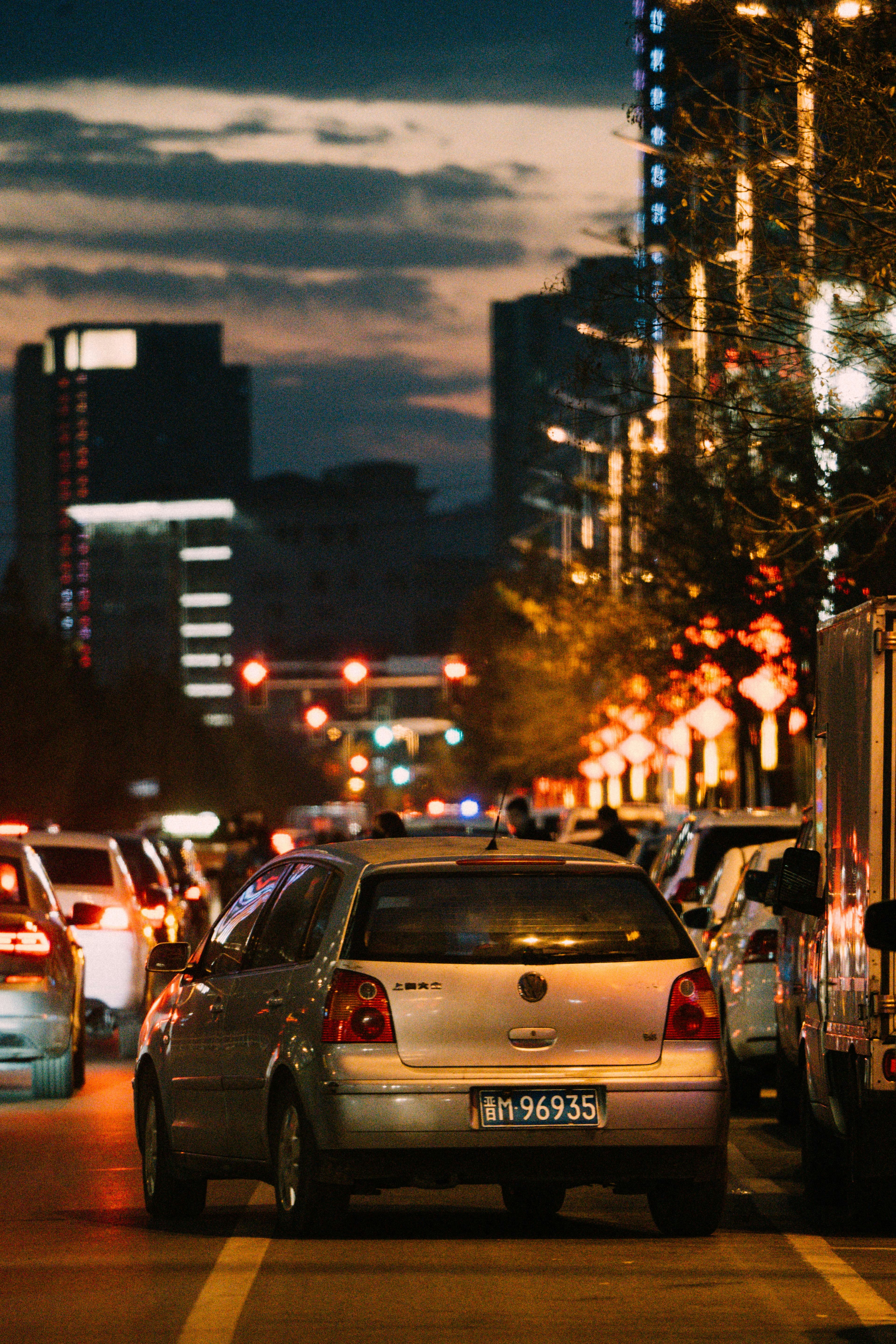 Cars on road during night time photo – Free Car Image on Unsplash