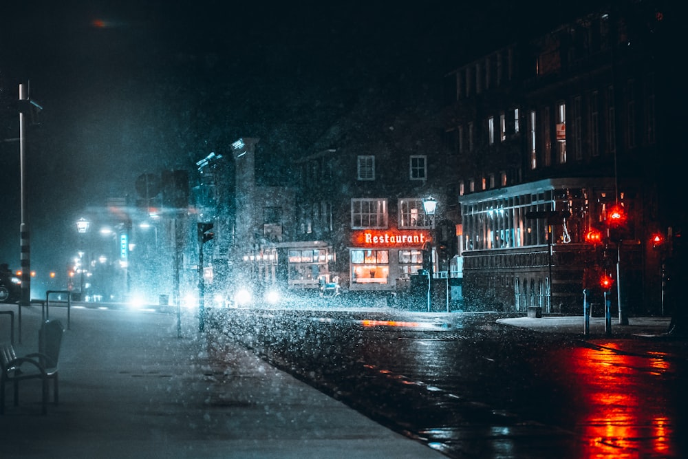 black car on road during night time