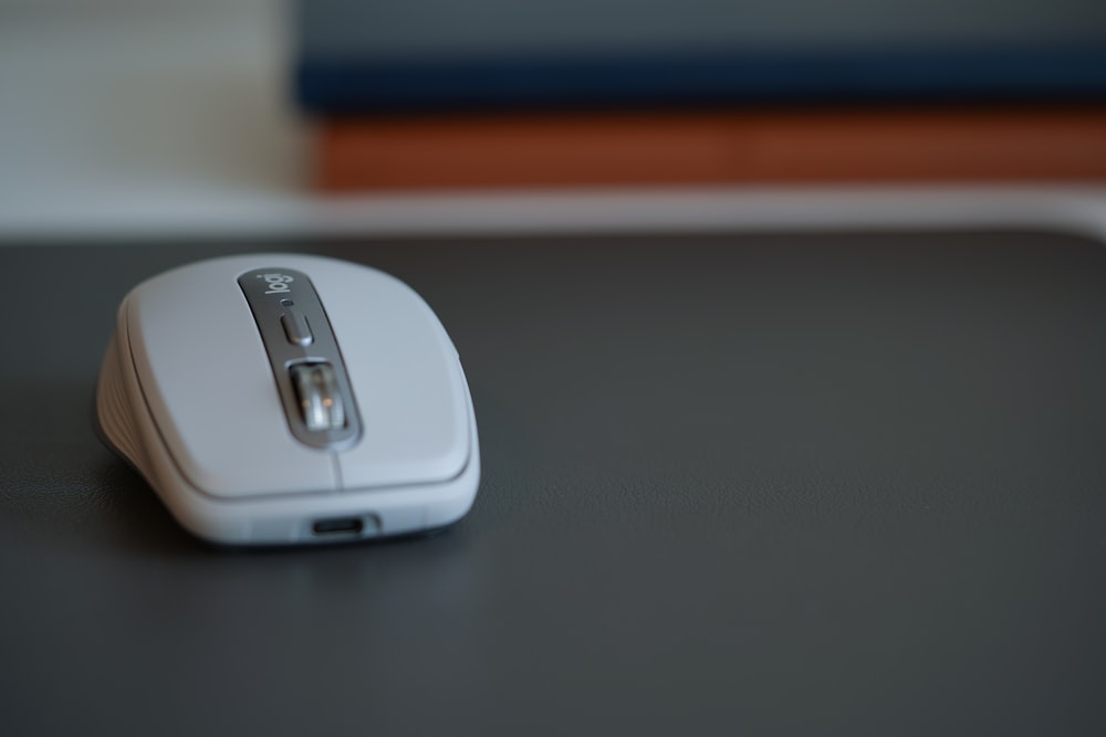 white and gray wireless computer mouse