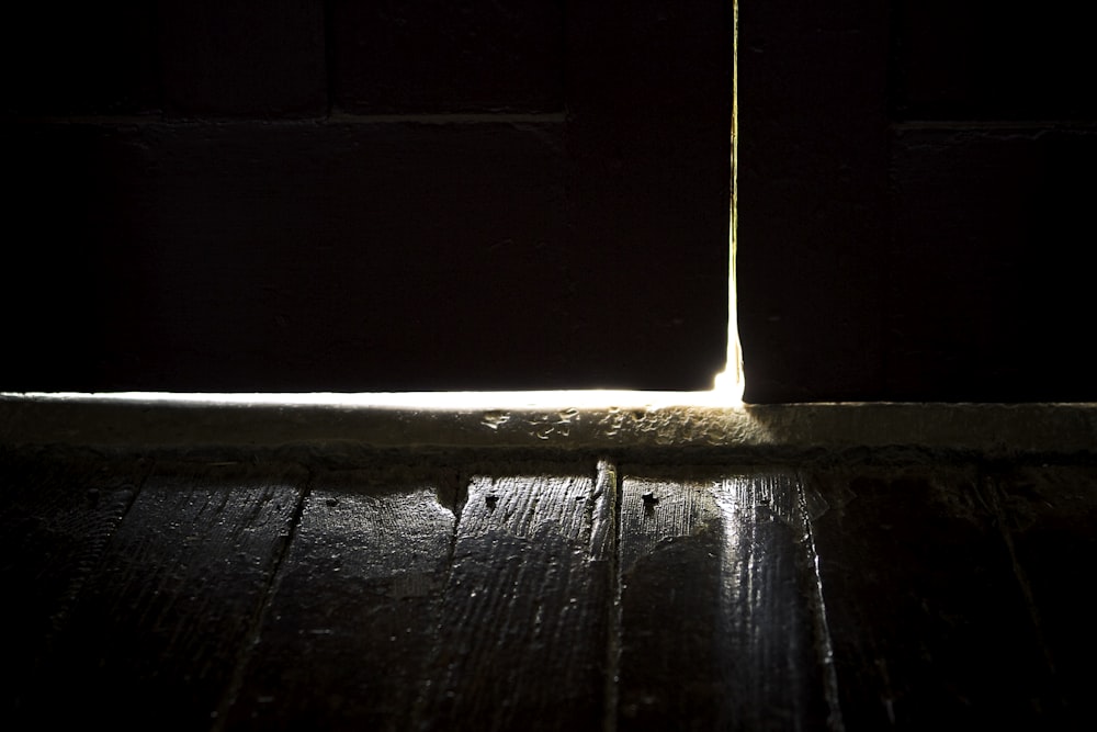black wooden floor with white light