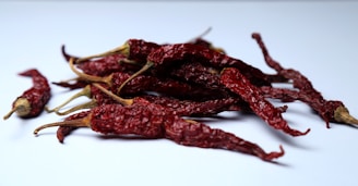 red chili on white surface