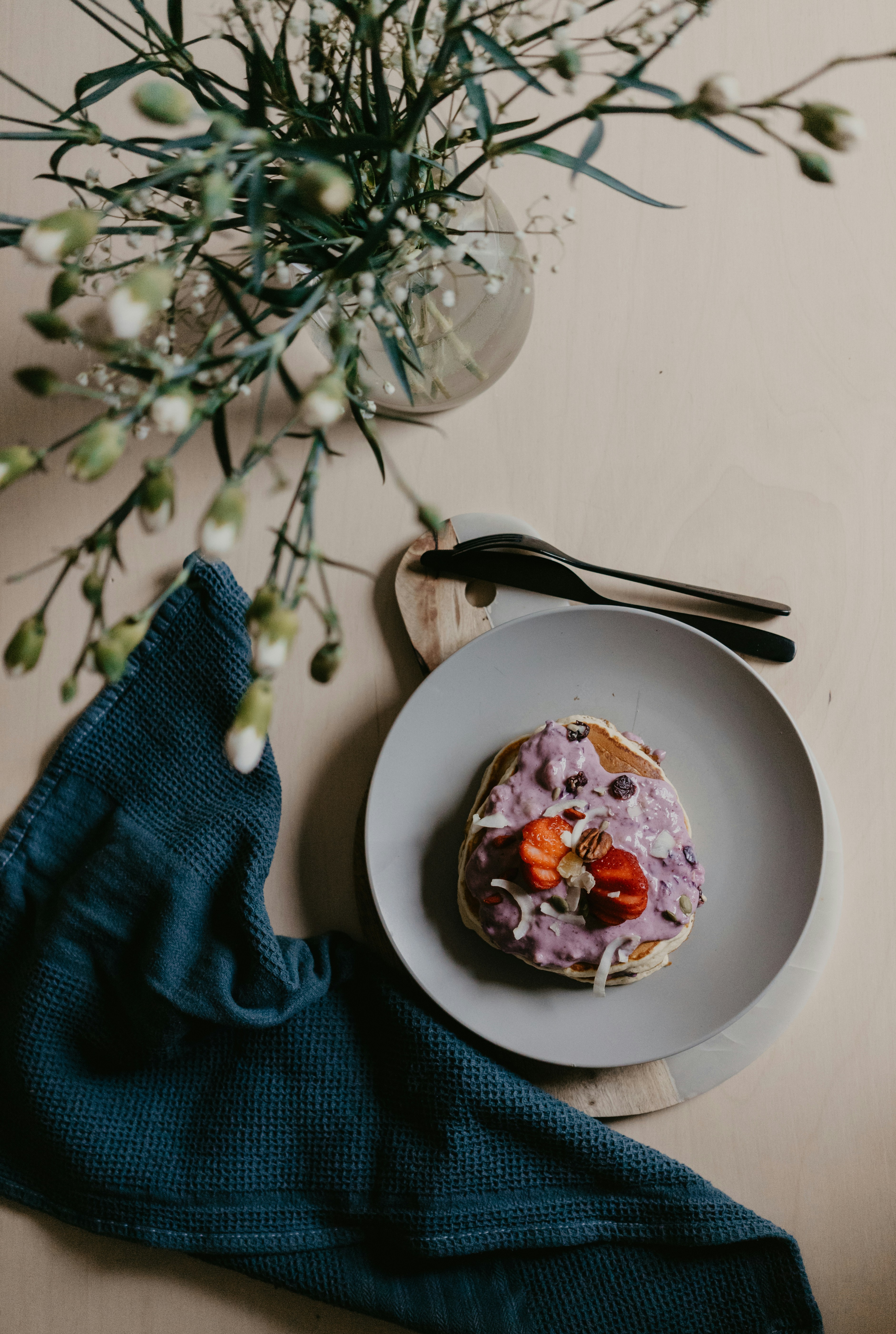 sliced pizza on white ceramic plate