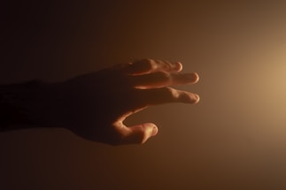 A warm hand reaching out to welcome someone in need.