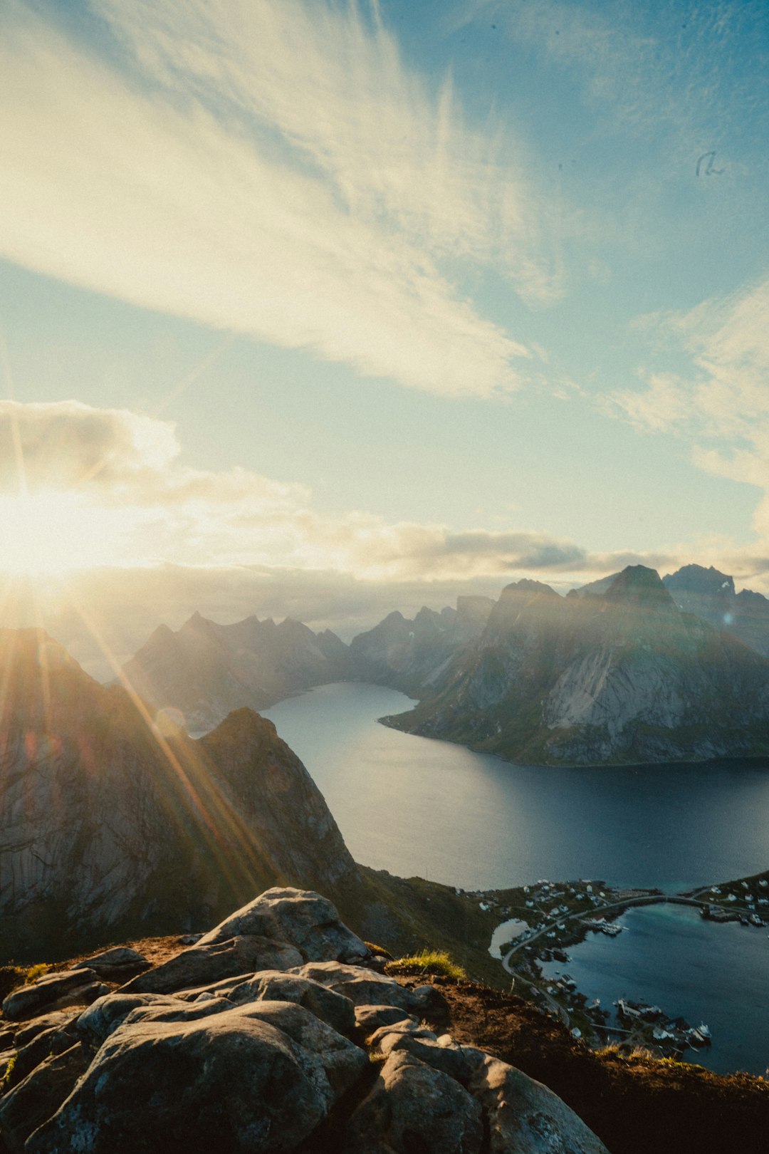 aerial view of lake and mountains during daytime