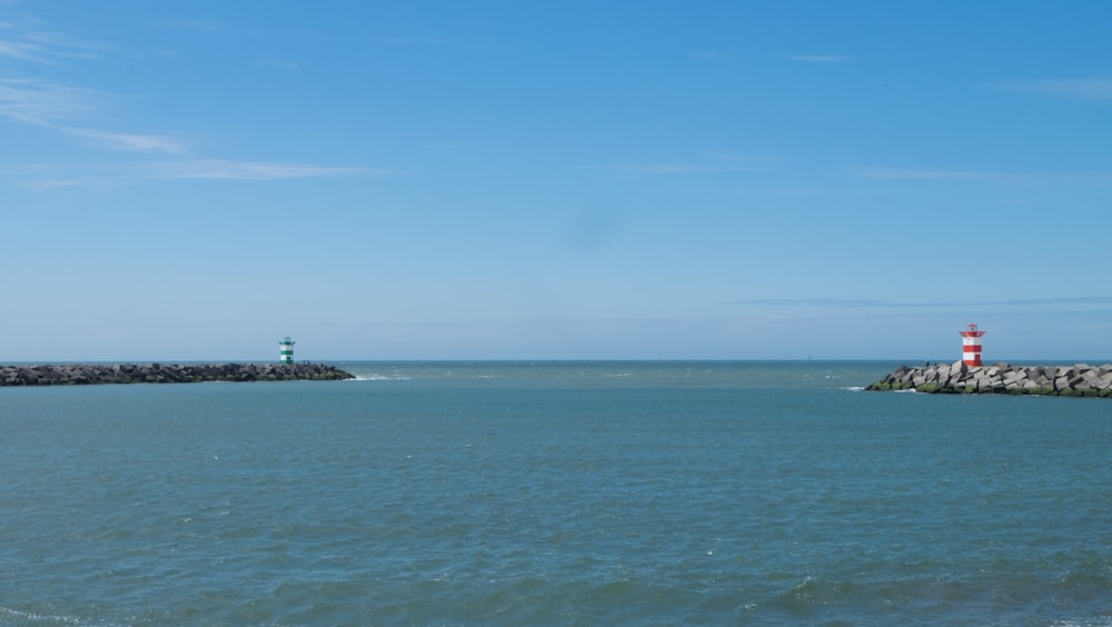 body of water under blue sky during daytime