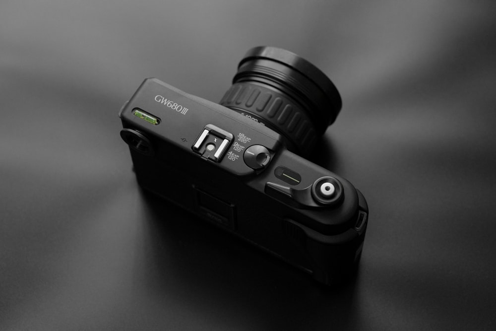 black and gray dslr camera