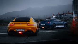 yellow and black porsche 911 on road during daytime