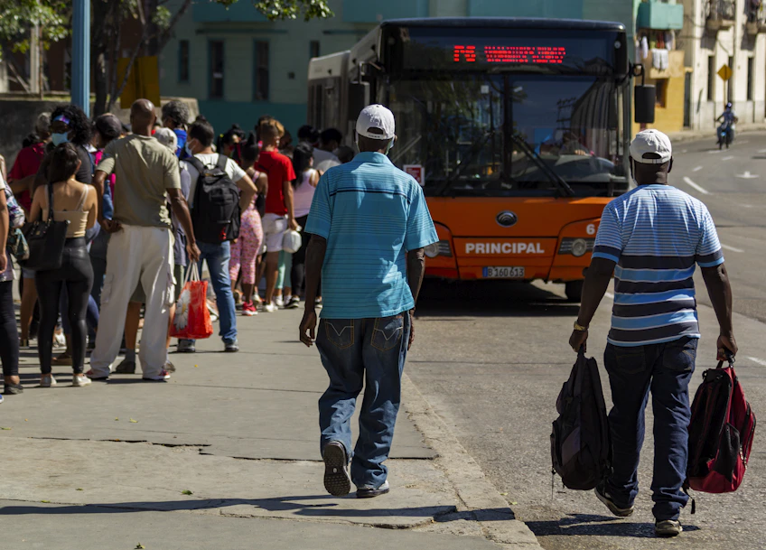 people walking on sidewalk during daytime