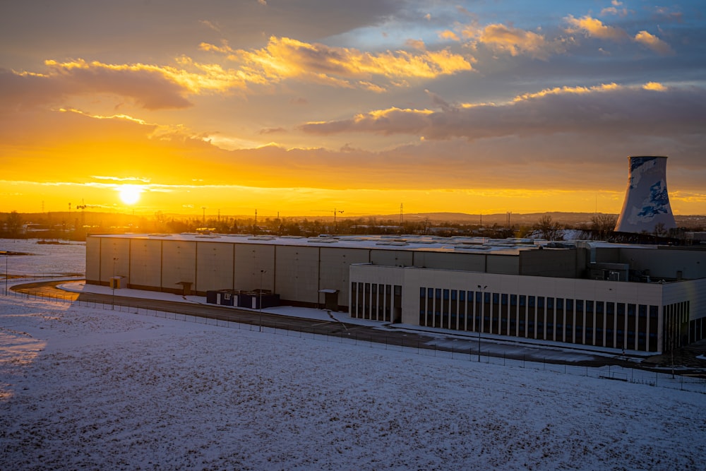 white and gray building during sunset