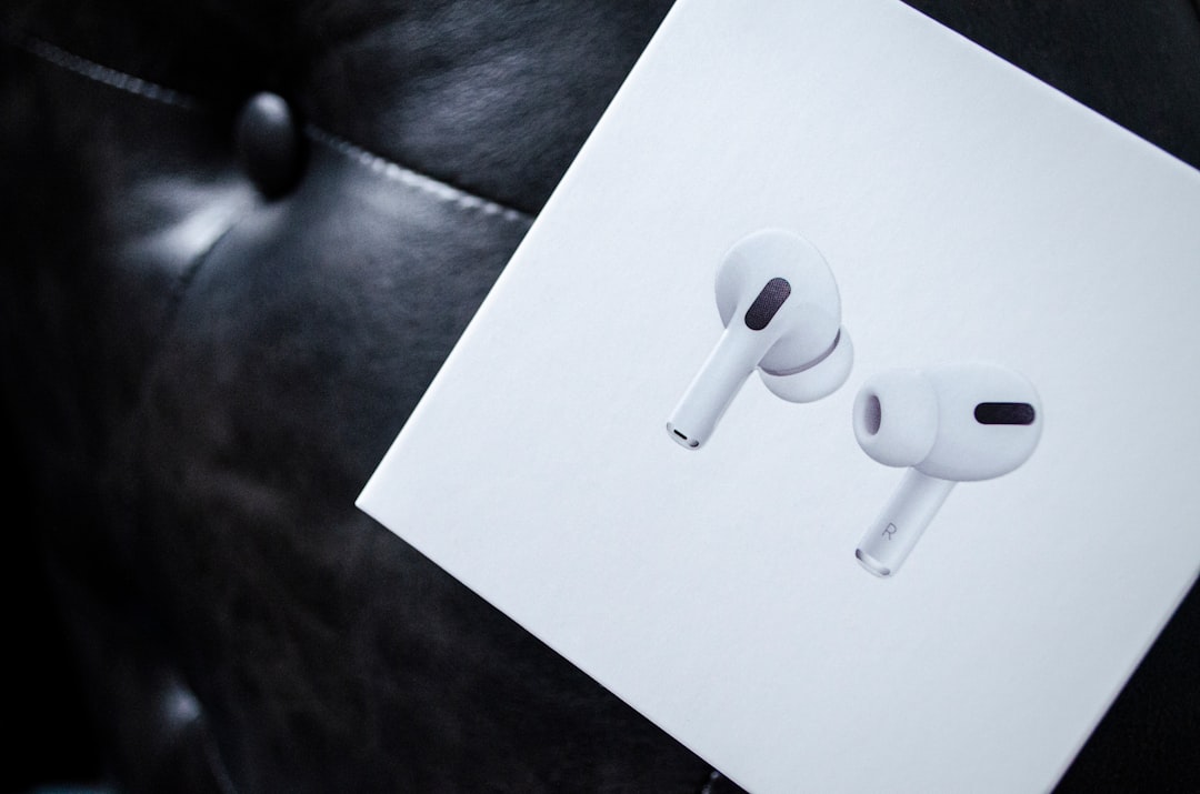 white earbuds on white paper