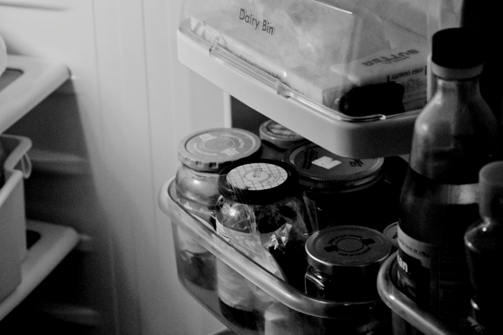 clear glass jars on white refrigerator