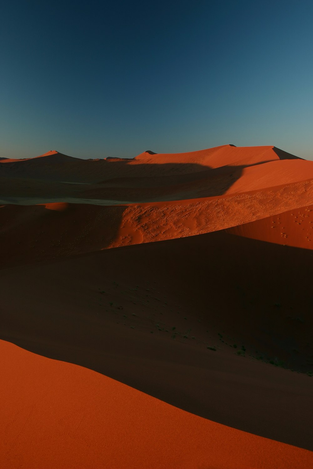 brown mountain under blue sky during daytime