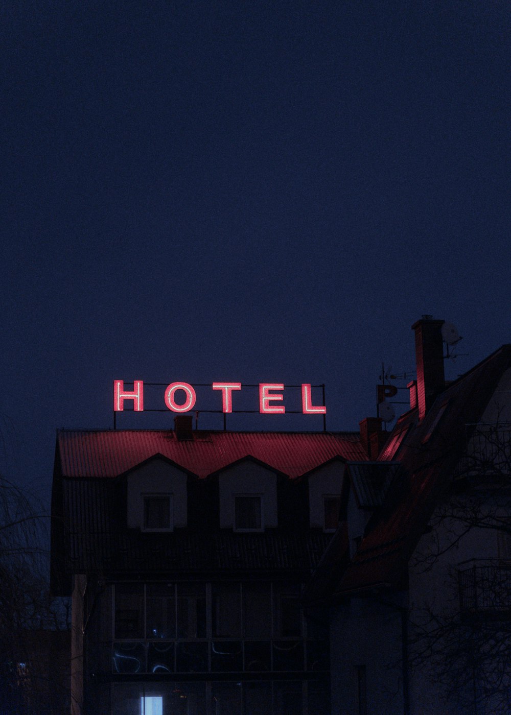 red and white open neon signage