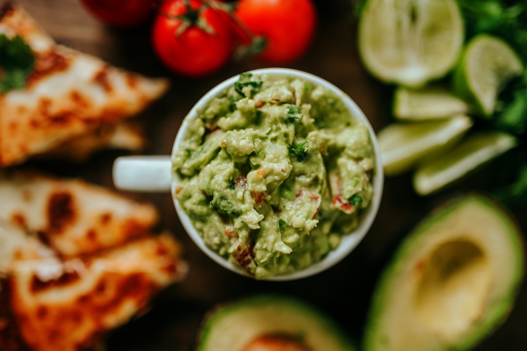 green vegetable on white ceramic bowl