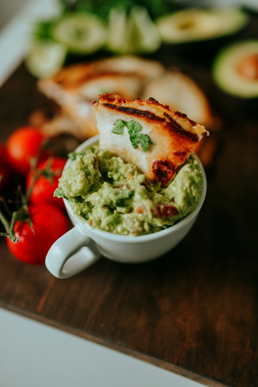 green soup in white ceramic cup