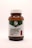 A brown glass bottle with a white cap contains CBD gummy bears. The label indicates THC-free broad-spectrum extract with 1350 mg of CBD. The flavor is delightful watermelon, and there are 30 gummies per bottle.