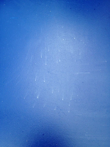 Texture of deep midnight blue stone with subtle golden veins.