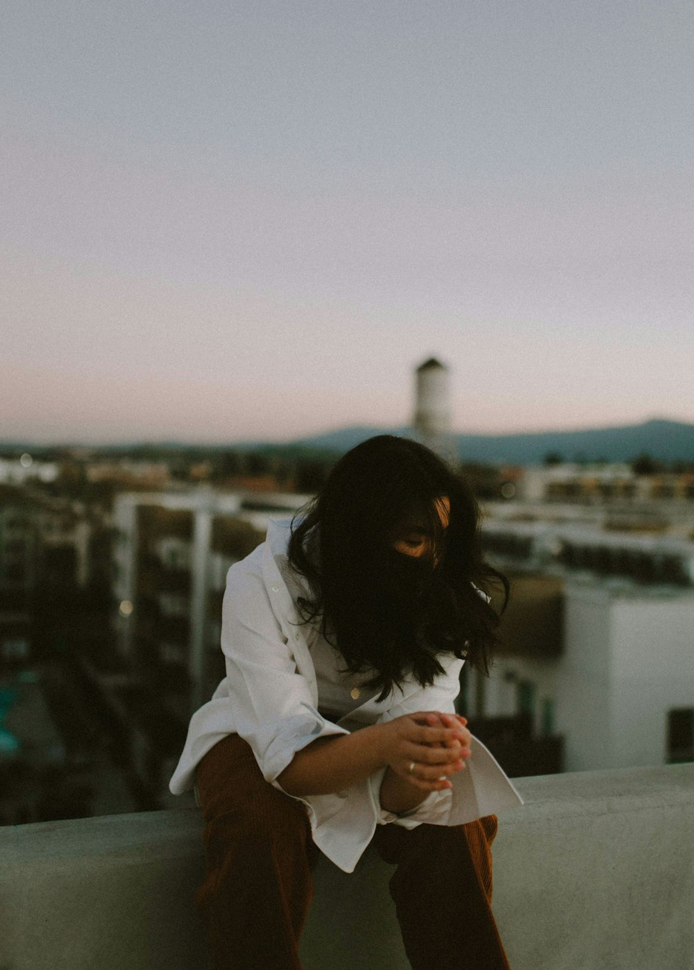 woman in white long sleeve shirt and black hijab