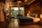 Warmly lit guest room with plush bedding and elegant decor at Blue Moon Residency.