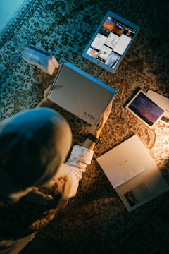 A vibrant photo showing an influencer unboxing a trendy product in a cozy, stylish room.