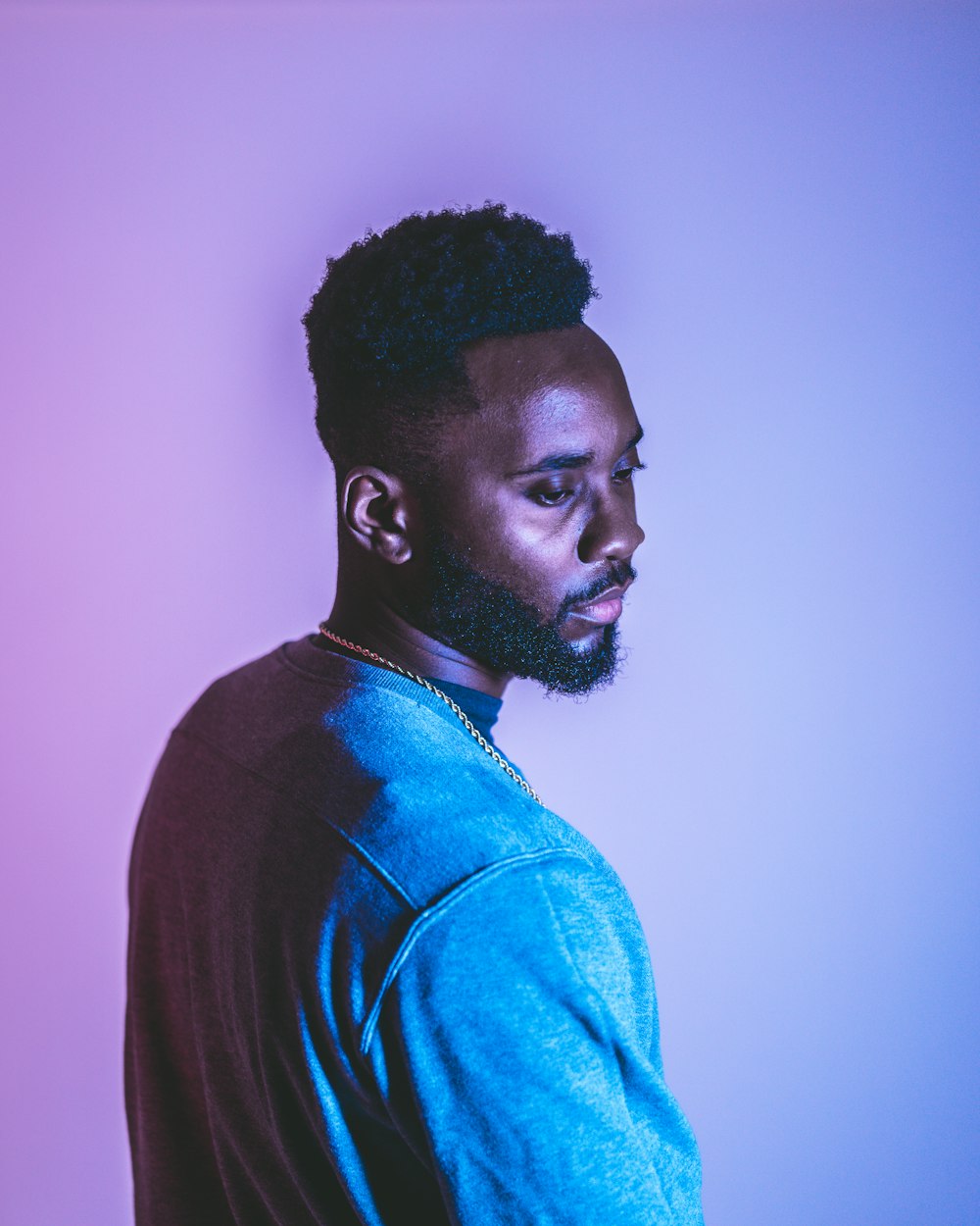 man in blue long sleeve shirt