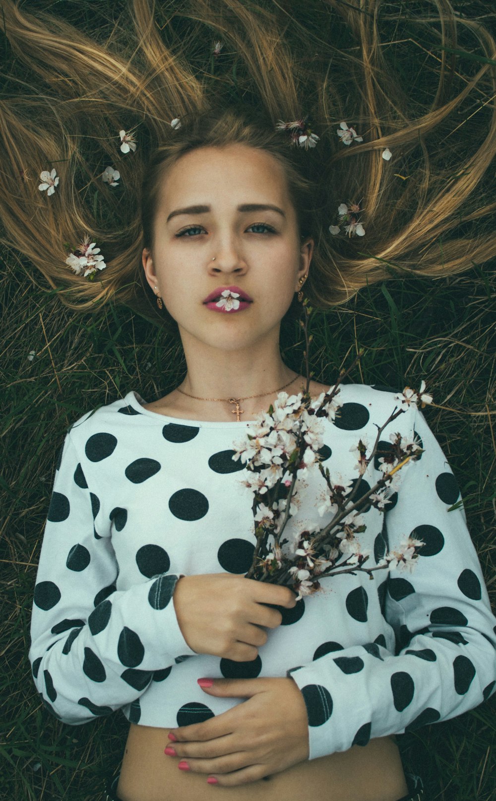 girl in white black and brown floral crew neck long sleeve shirt