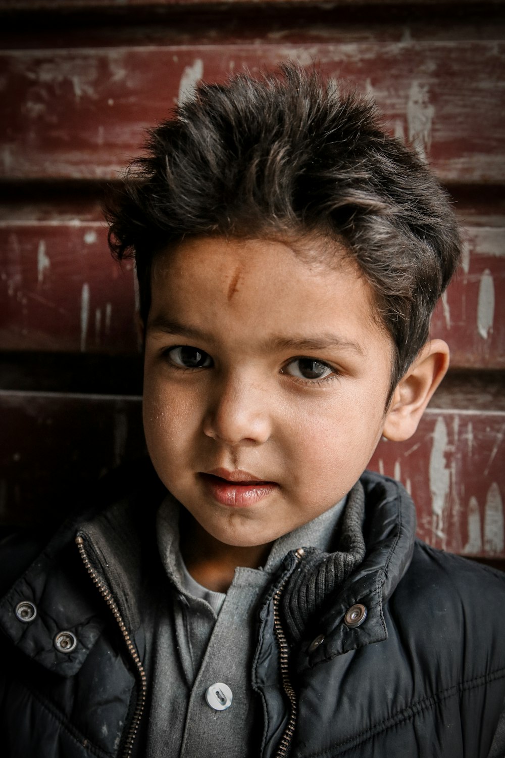 boy in black leather jacket