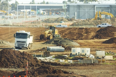 white and brown heavy equipment