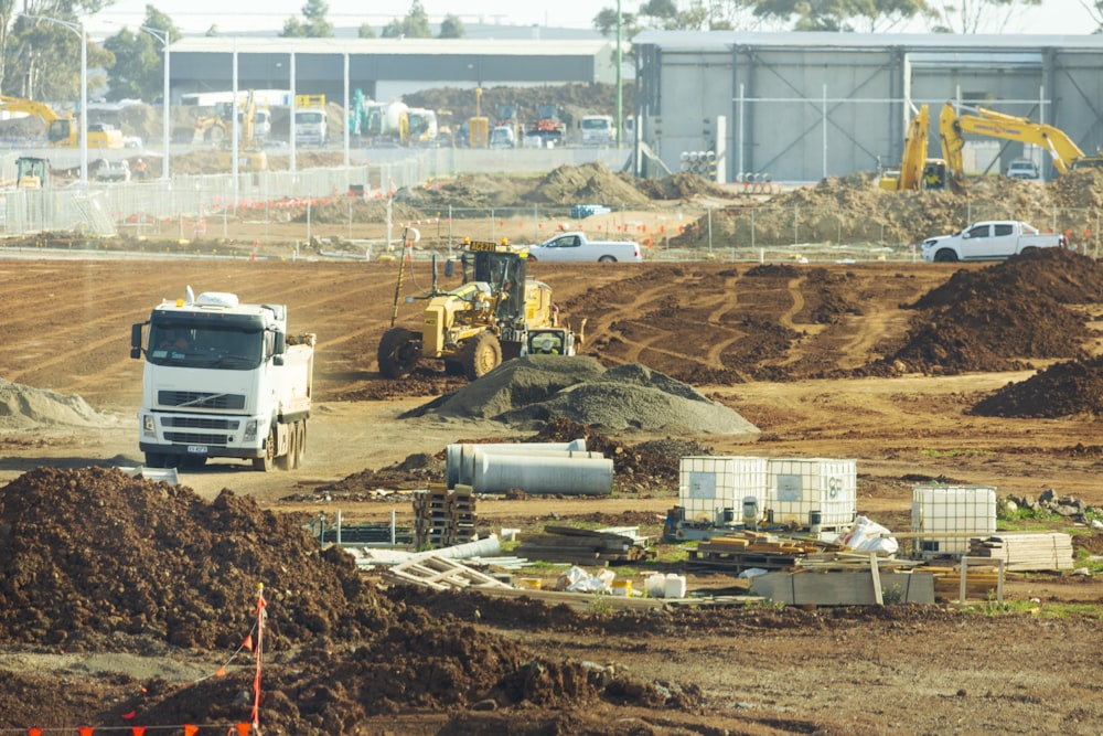 white and brown heavy equipment