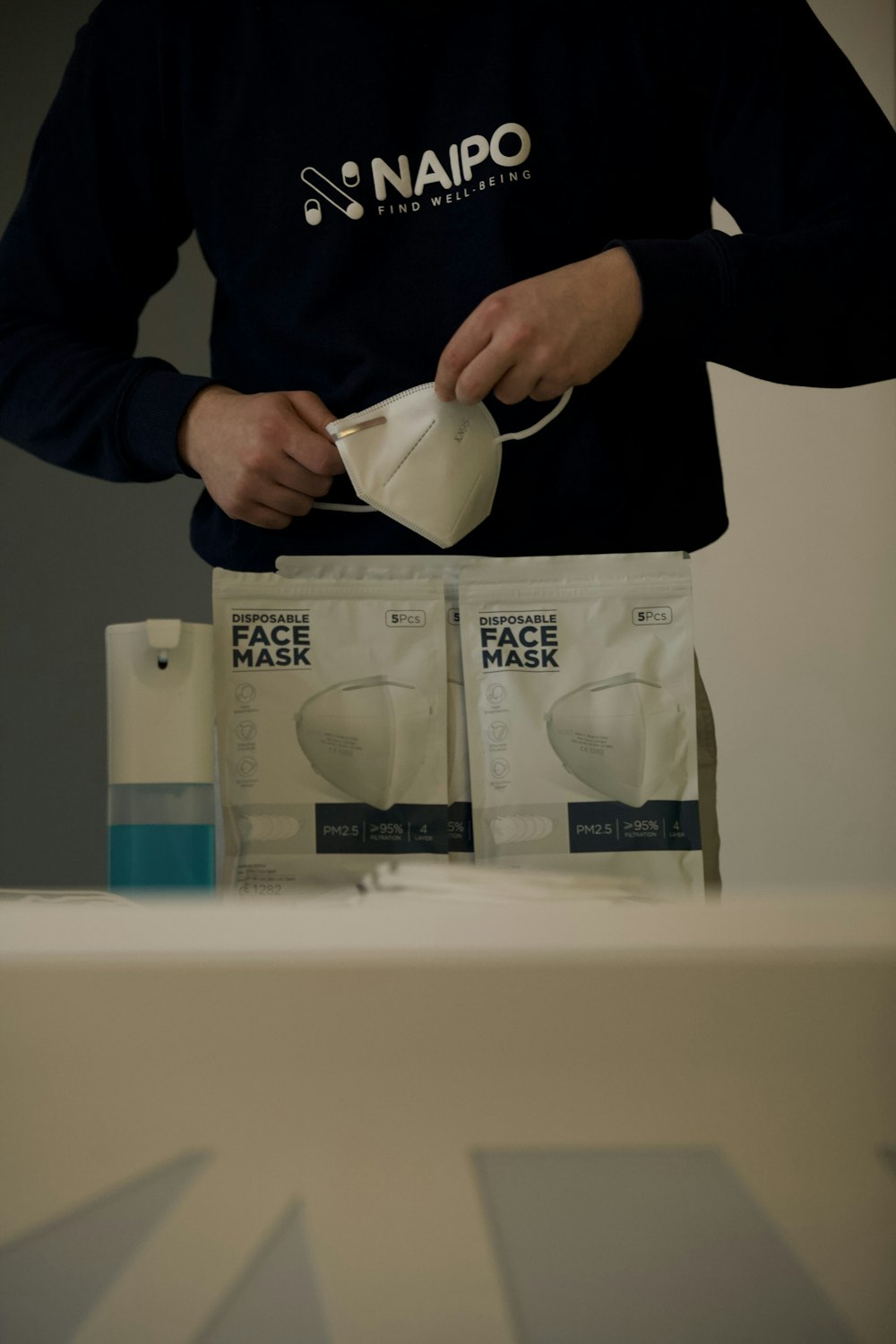 person holding white ceramic mug