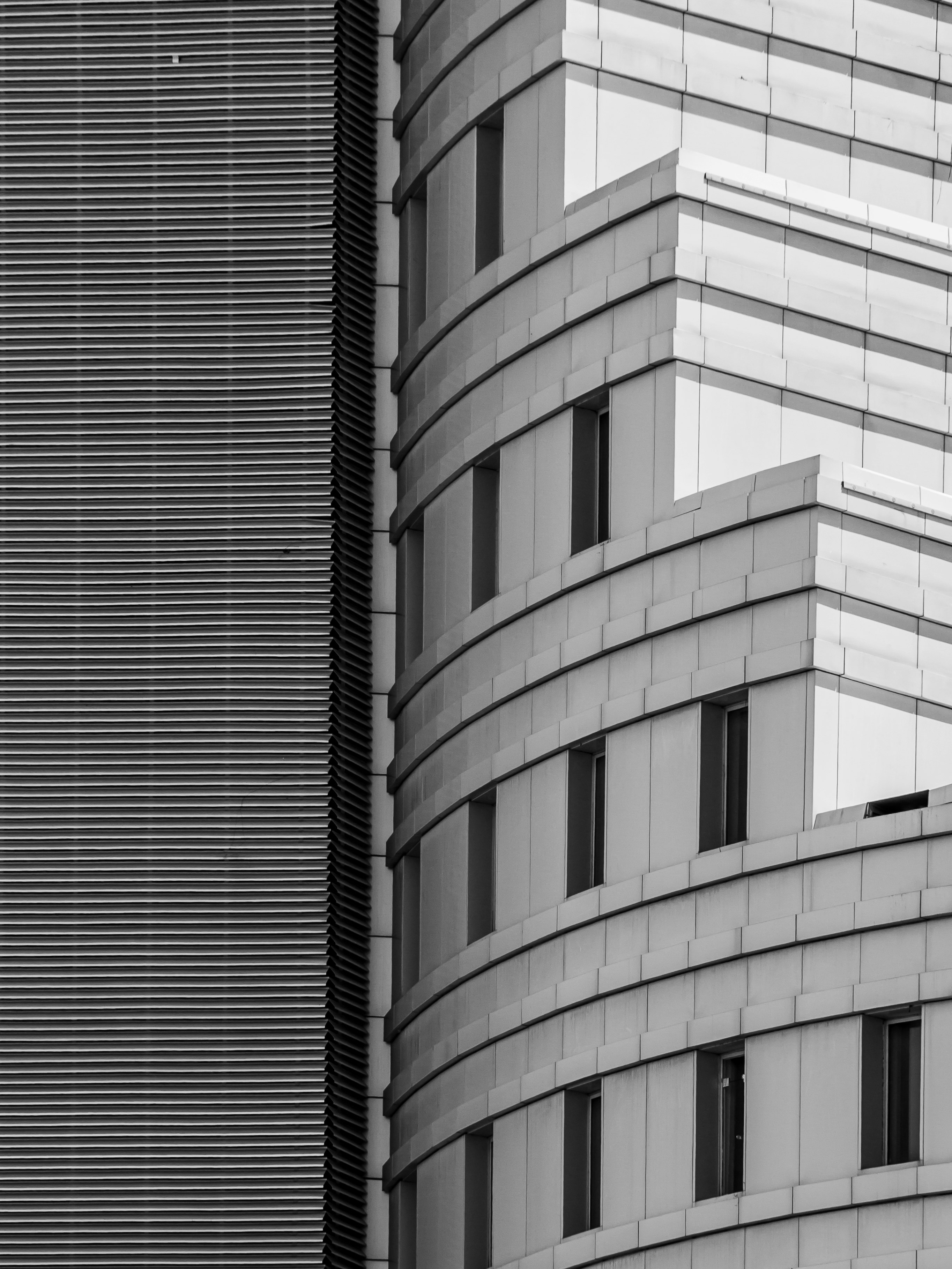 grayscale photo of concrete building