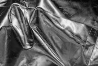 black textile on white textile