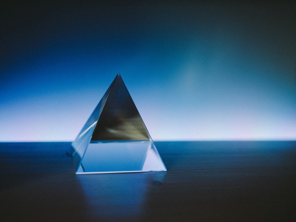 white pyramid on blue sky