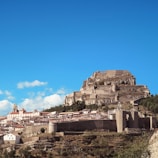 brown and white concrete buildings under blue sky during daytime