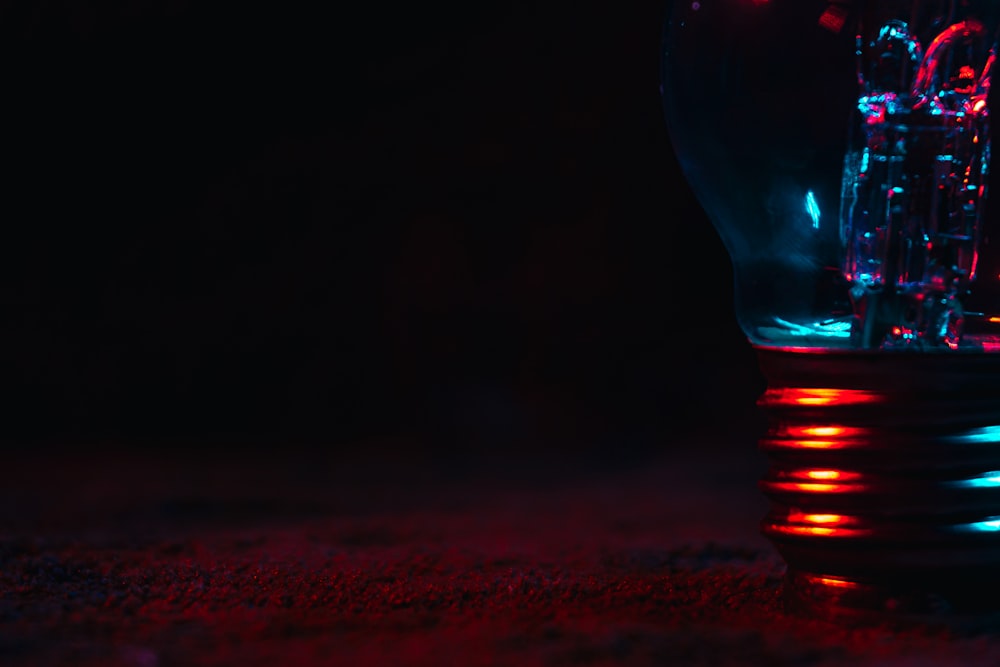 red light bulb on brown surface