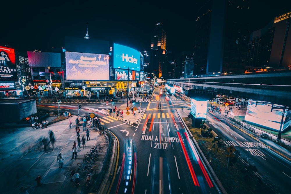 time lapse photography of cars on road during night time