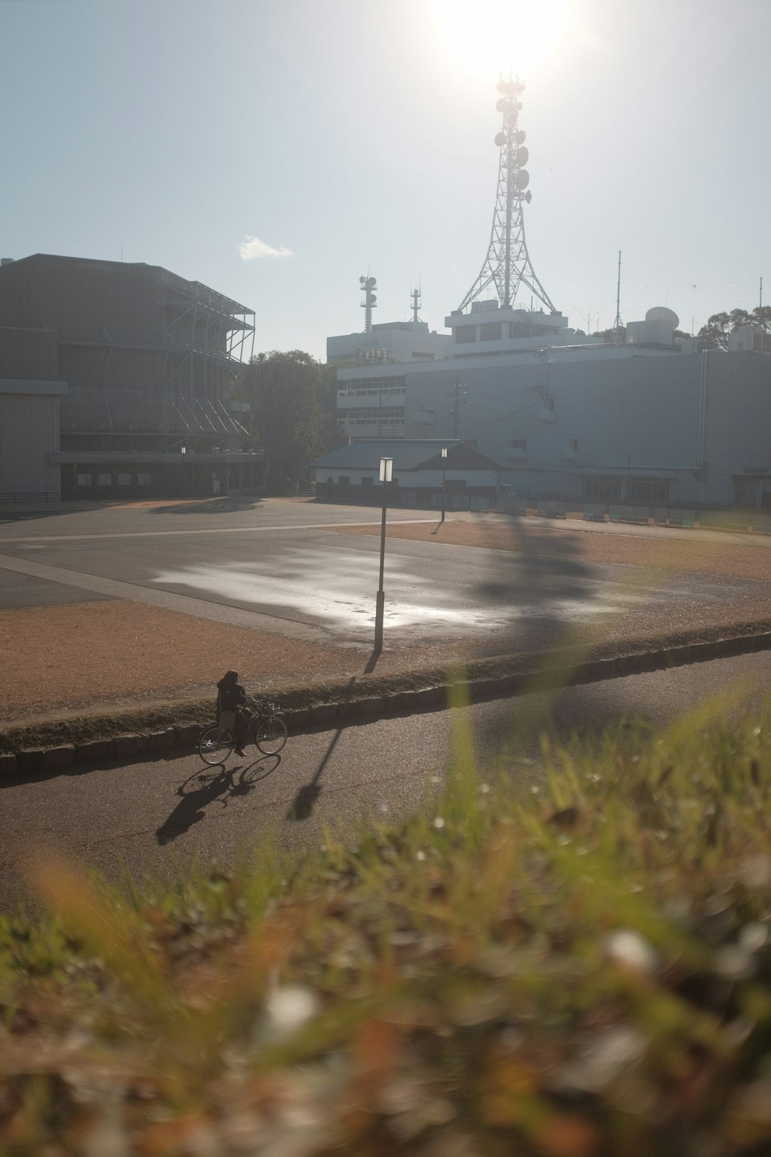 people walking on sidewalk near building during daytime