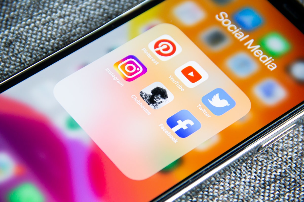 Social media app icons on an iPhone's screen