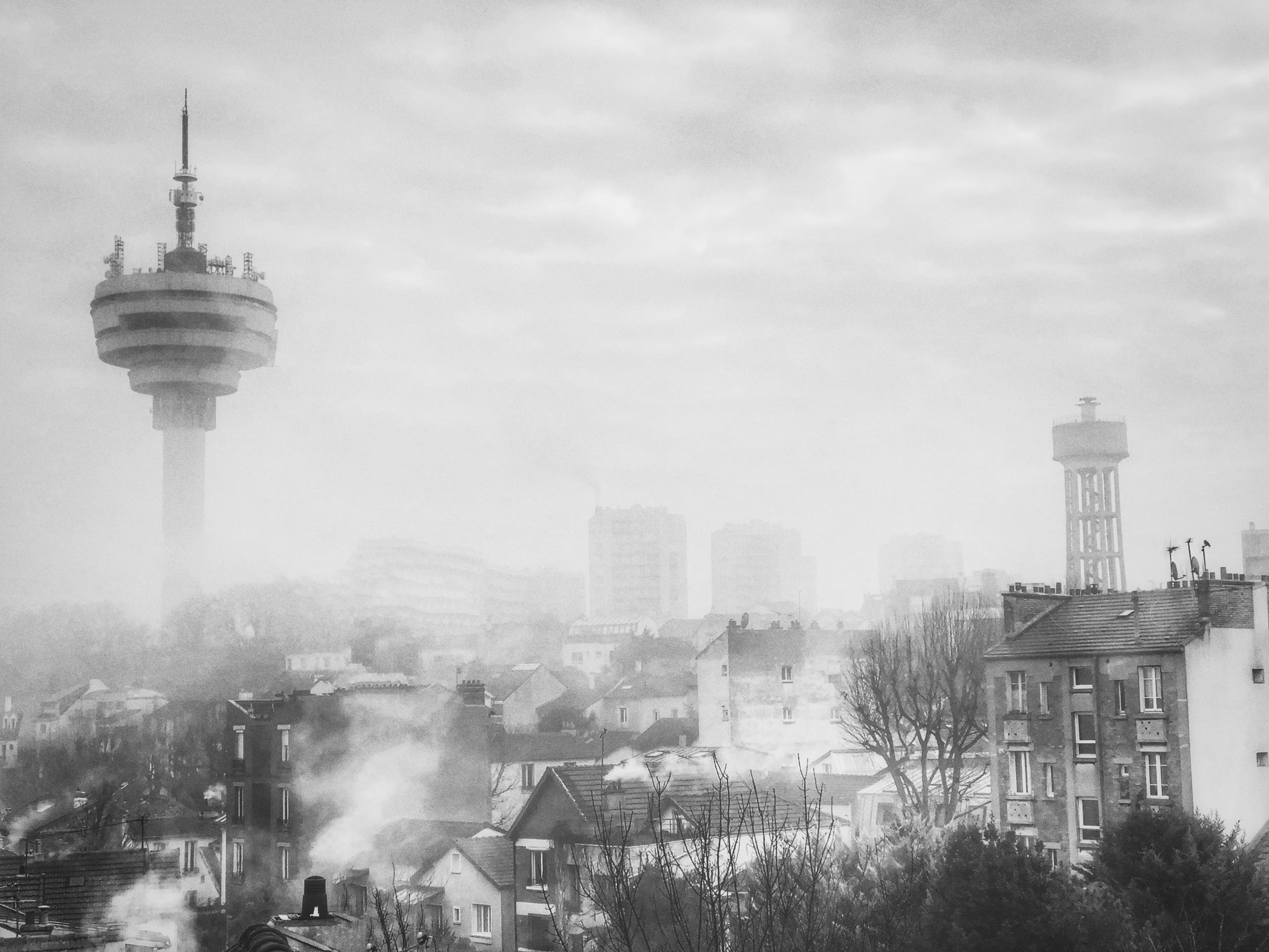 grayscale photo of city buildings