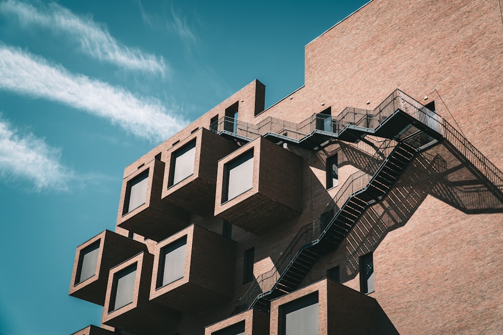 brown concrete building under blue sky during daytime