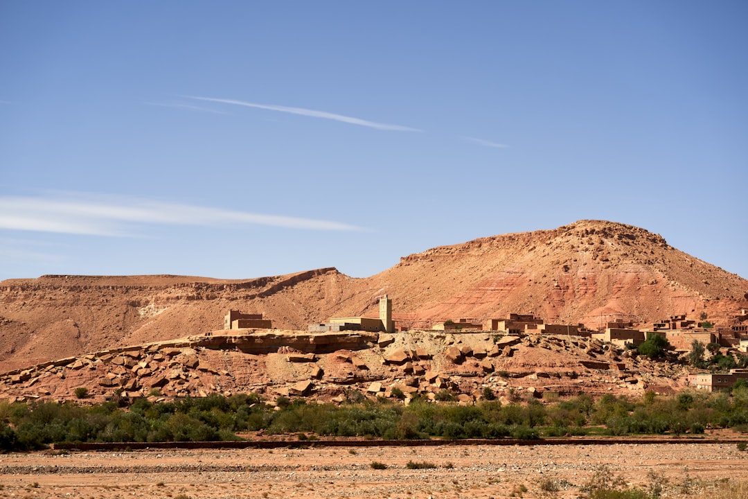 brown rock formation under blue sky during daytime