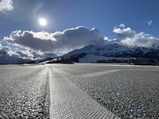 A clean, freshly pressure-washed driveway shining under the Arizona sun.