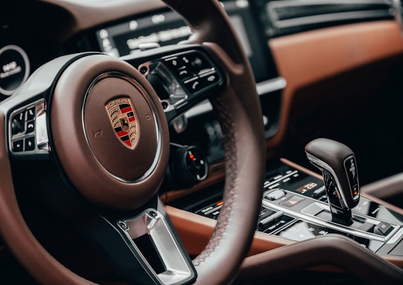 black and brown nissan steering wheel