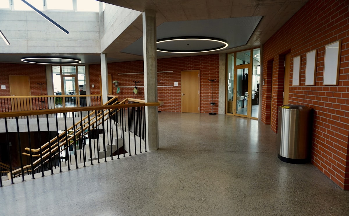 Gray flake garage epoxy floor with a clean showroom finish