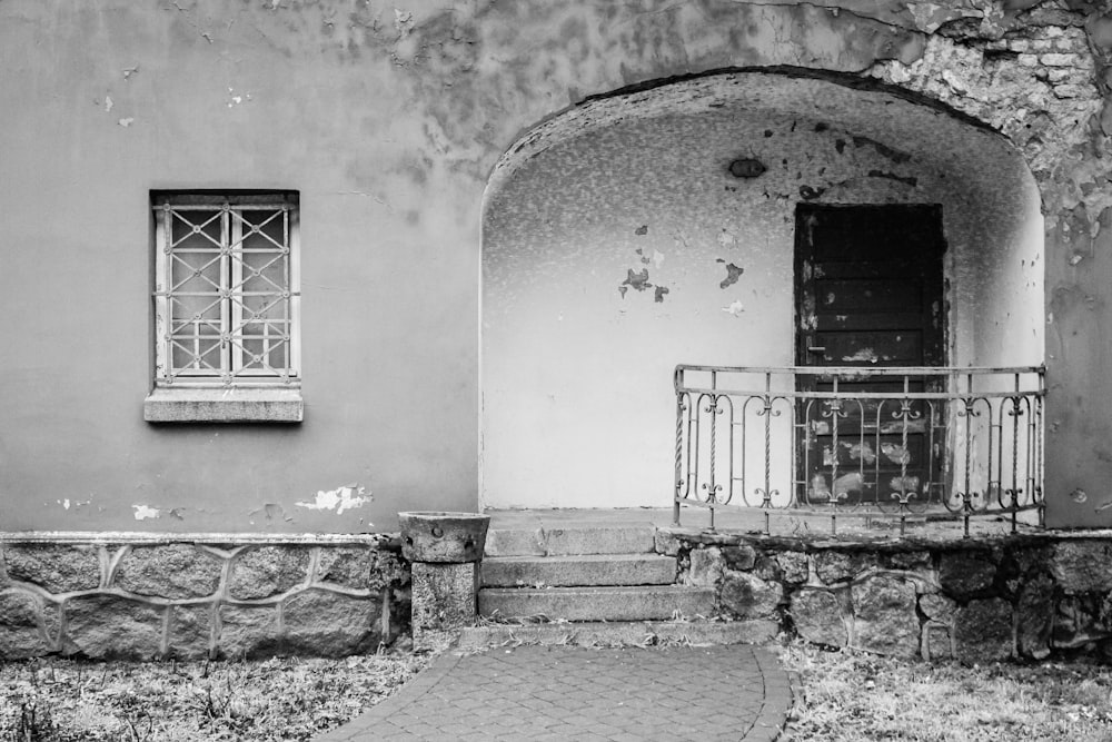 grayscale photo of concrete building